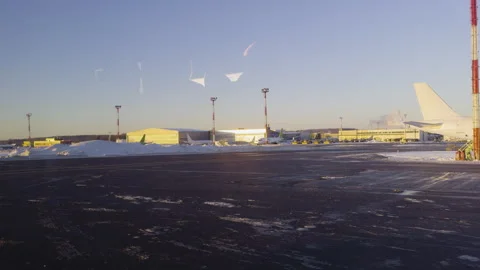 : Airplane window view during movement across airport Stock Footage 342812077