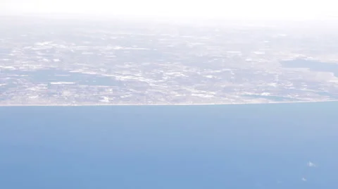 Airplane Window View of Earth, Flying Stock Footage 47567678