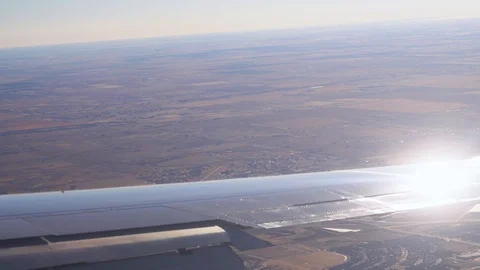Airplane window view in flight from the sky Stock Footage 107941986