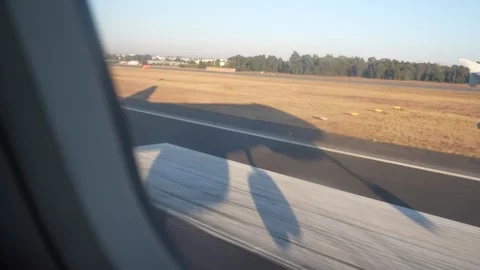 Airplane Window View Flying Low and Landing at O R Tambo International Airport Stock Footage 338044850