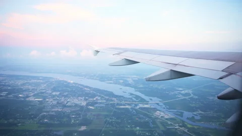 Airplane window view flying through Saharan dust plume in Ft Myers Florida Stock-Footage 166665006