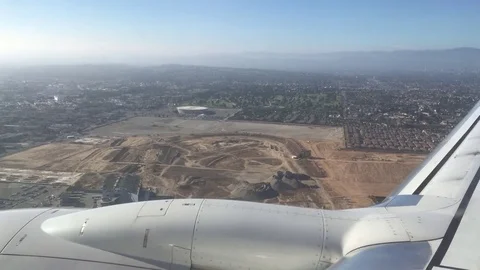 Airplane window view landing at lax part1 - 4k Stock Footage 80542328
