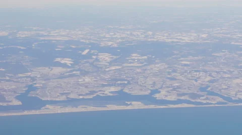 Airplane Window View, looking at Earth,  Flying Stock Footage 47567169