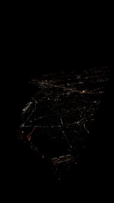 Airplane window view at night Stockbeeldmateriaal 334533971