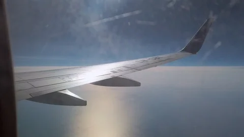 Airplane window view over city ground with Aerolineas Argentinas winglet. Stock Footage 105031428