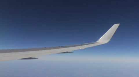 Airplane Window View, Silver Wing Flying Stock Footage 47566857