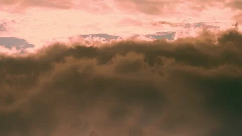 Airplane Window View, Stormy Sunset Sky with Rain Black and Sunny White Orange C Stock-Footage 328501264