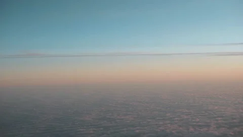 Airplane window view at sunset sunrise Stock Footage 123333121