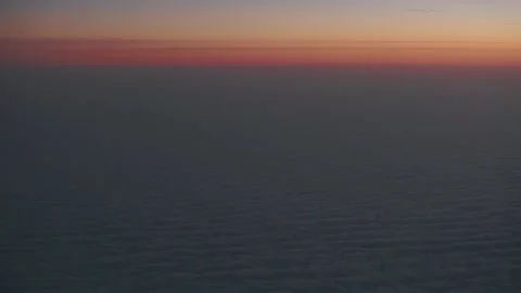 Airplane window view at sunset sunrise Stock Footage 123333492