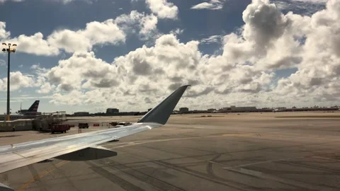 Airplane window view before taking off from Miami International Airport. Stock Footage 151981250