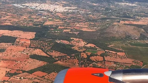 From the airplane window you can see the turbine and the surface Stock Footage 115542274