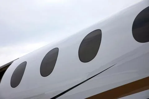 Airplane windows close-up Stock Photos