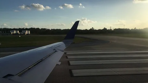 Airplane windowview takeoff day - 4k Stock Footage 80542324