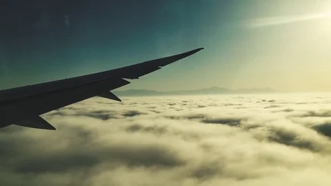 Airplane Wing Above The Clouds 1 Stock Footage 79018825