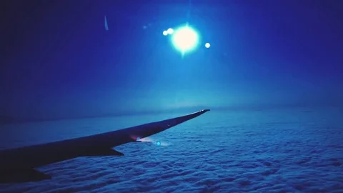 Airplane Wing Above The Clouds Blue Lens Flare Sun Stock Footage 79018845