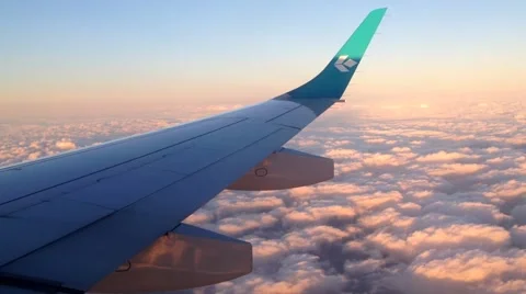 Airplane wing above the clouds Stock Footage 40343234