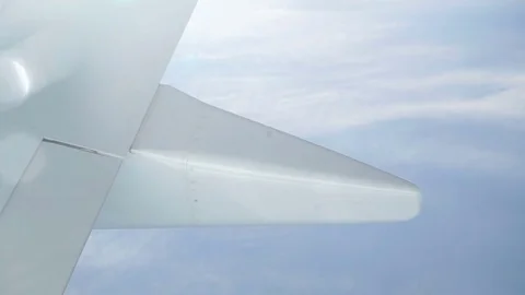 Airplane Wing Above Clouds Stock Footage 83598235