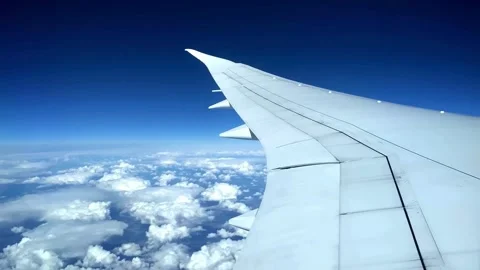 Airplane Wing Above Cloudscape Aerial View Stock Footage 310325939
