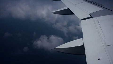 Airplane wing above the dark clouds Stock Footage 91972166