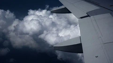 Airplane wing above the dark clouds Stock Footage 91972370