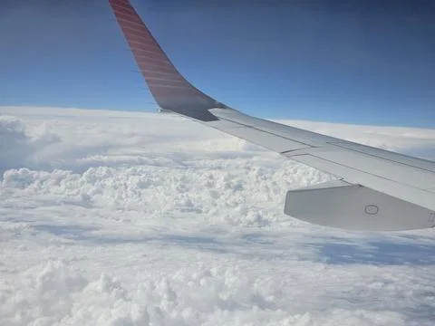 Airplane Wing Above Dramatic Clouds on Flight from Cordoba to Buenos Aires Stock Photos