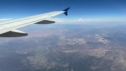 Airplane Wing Above Epic Utah Nevada Mountain Range. View Through Plane Win.. Stock Footage 339295568