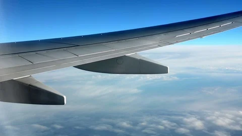 Airplane wing in action Stock Footage 98556437