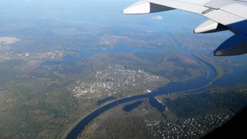 Airplane wing and beautiful landscape from the airplane window. Stock Footage 166315142