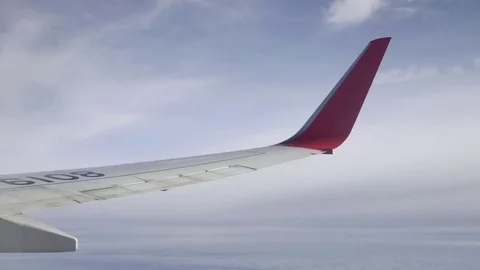Airplane Wing and Clouds Stock-Footage 85286865