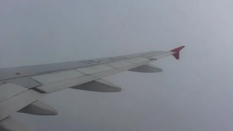 Airplane Wing and Clouds Video stock 92936232