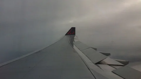 Airplane wing and clouds Stock Footage 111036919
