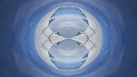 Airplane wing and clouds made into spherical pattern Stock Footage 309054448