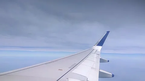 Airplane wing and sky Video stock 154307869