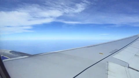 Airplane wing and sky Stock-Footage 155014594