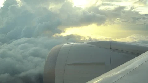 Airplane wing and sky view from window at dusk Stock Footage 119187797