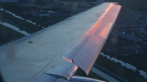 Airplane wing and sunset Video stock 167905166