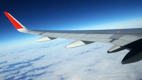 Airplane wing on blue sky, airplane travel concept, aerial landscape Stock Footage 166317010
