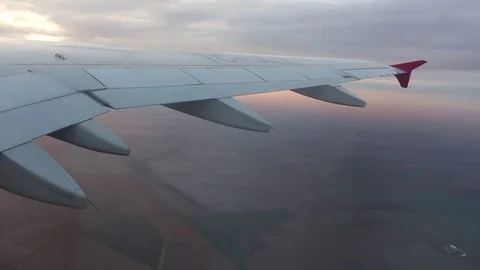 Airplane Wing, Clouds and the Sunset Video stock 82276345