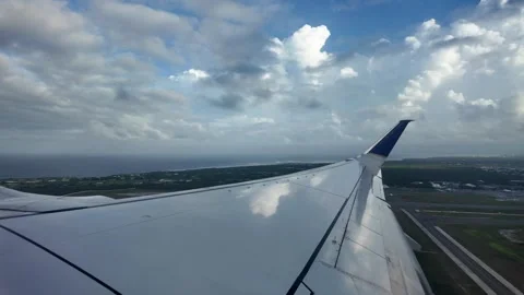 Airplane Wing with Cloudscape and Sunset Horizon View Stock Footage 312752849