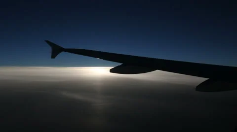 Airplane wing in dramatic lighting Stock Footage 42956825