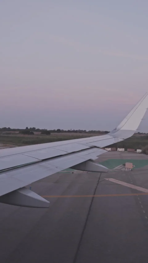 Airplane wing during takeoff in vertical Stock Footage 319427929