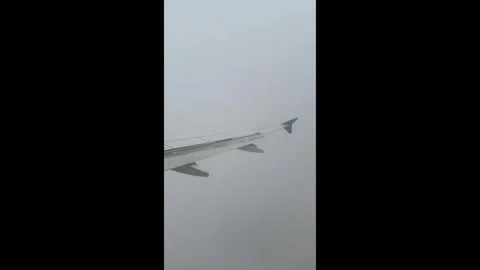 Airplane Wing Flies Above Clouds to Beautiful Blue Sky. Silver 747 Plane Tu.. Stock Footage 339295693