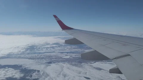 Airplane wing flight in clouds Stock Footage 104217388