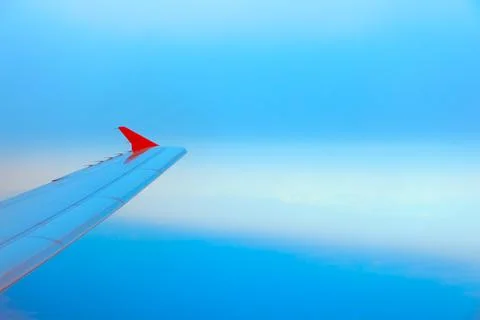 Airplane wing in flight Stock Photos