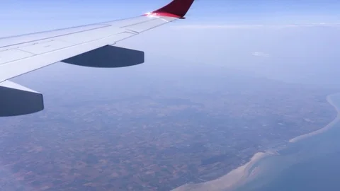Airplane wing flying Stock Footage 114818547