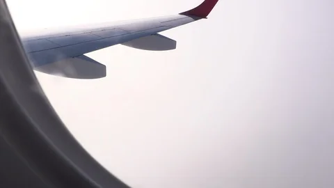 Airplane wing flying Stock Footage 114842368