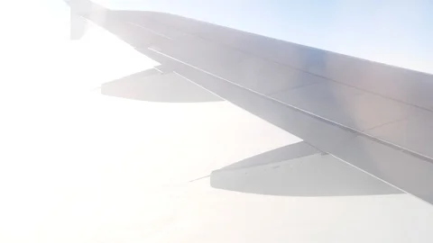 Airplane wing flying plane. 4k Stock Footage 86204531
