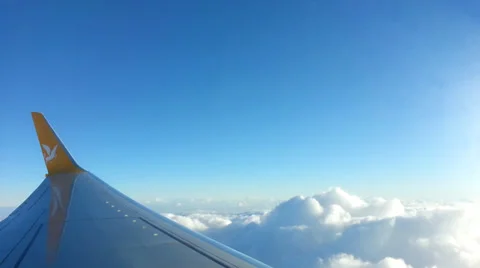 Airplane Wing Flying Through the Clouds Stock Footage 36204166