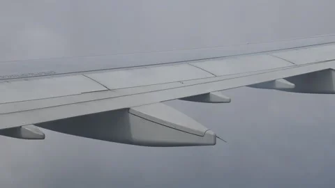 Airplane Wing Flying Through Thick Clouds After Takeoff Stock Footage 321583290