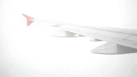 Airplane Wing As It Goes Through A Cloud Video stock 98755300